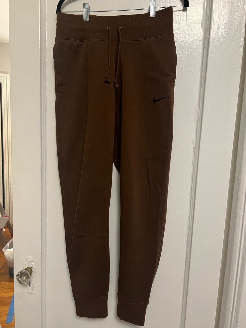 Women’s Nike Brown Track Joggers with Black Swoosh. Never worn, no tags.